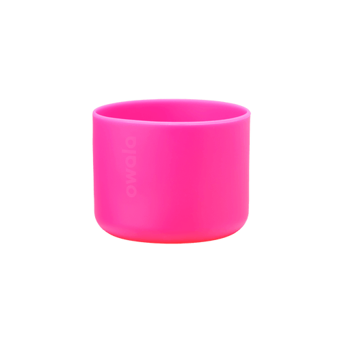Owala Bottle Boot in vivid hot pink silicone with tonal Owala logo, wide short cylindrical form sized for the 32oz bottle