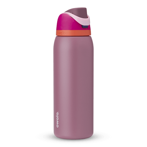 FreeSip 40oz in Crown Jewel, dusty mauve body with hot pink flip cap, light pink carry loop, and bright orange accent band
