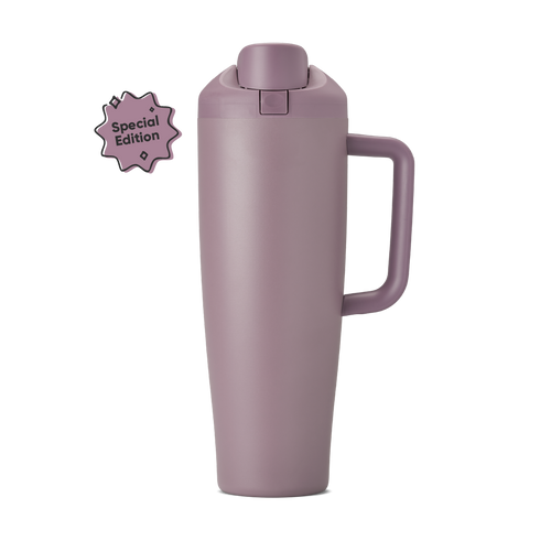 FreeSip Tumbler 40oz in Spring Revival, dusty mauve-purple insulated cup with matching flip cap, push-button, lid, and side handle