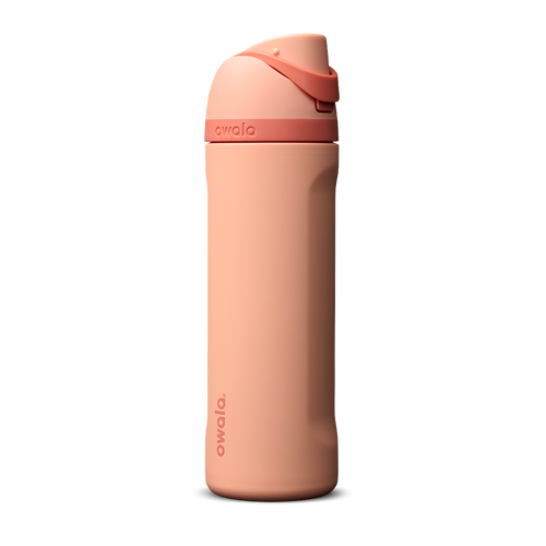 Owala FreeSip 24oz in Peach of Mind, soft coral peach insulated bottle with matching peach flip cap and carry loop