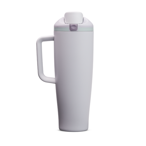FreeSip Tumbler 40oz Open Air, pale lavender/light purple body with matching lavender flip cap, light blue accent band, and lavender handle
